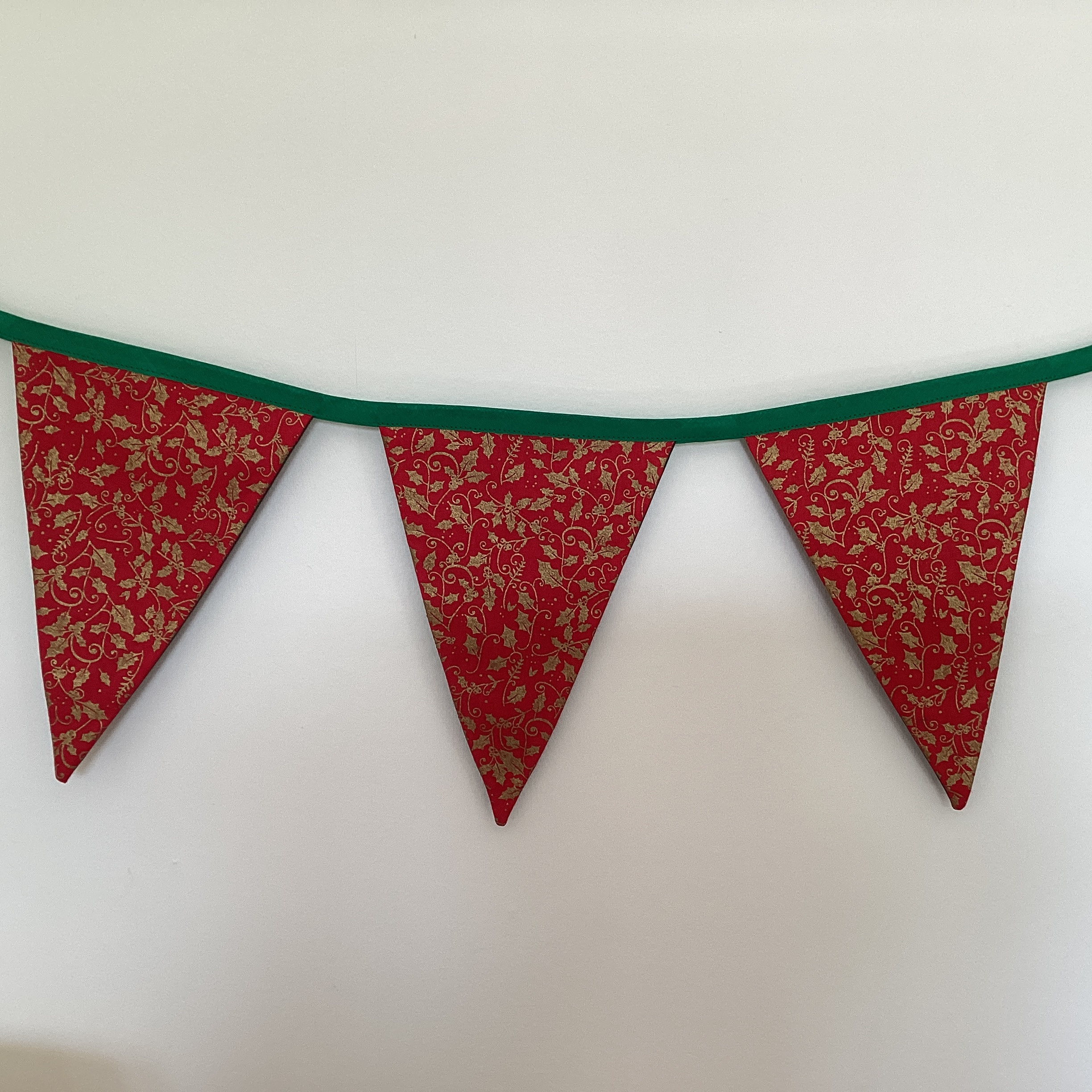 Christmas Bunting - small gold holly on red